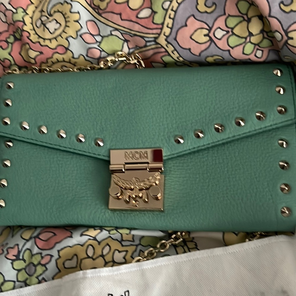 Small MCM wallet purse Teal colored . Comes with box and bag